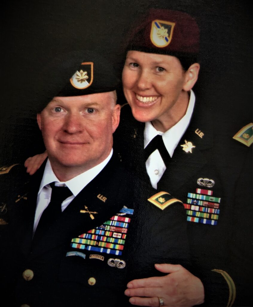 Travis and Ashley together in U.S. Army uniforms